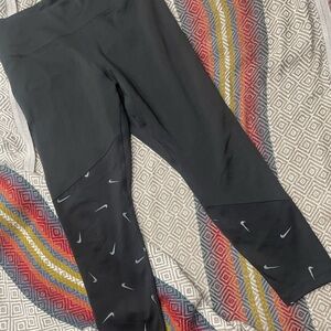 Nike asymmetrical Dri-fit swoosh leggings